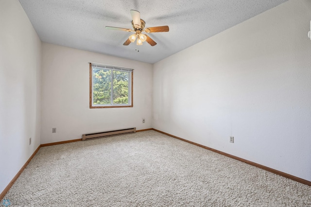 2802 29th Ave S, Moorhead, MN 56560 - unfurnished room featuring baseboard heating, carpet flooring, a textured ceiling, a ceiling fan, and baseboards