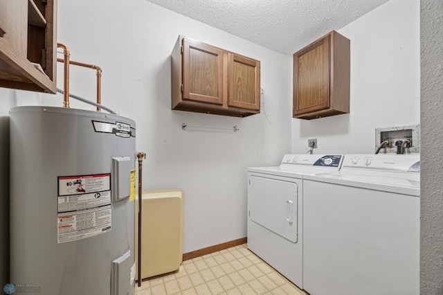 2802 29th Ave S, Moorhead, MN 56560 - washroom with electric water heater, washing machine and dryer, cabinet space, a textured ceiling, and baseboards