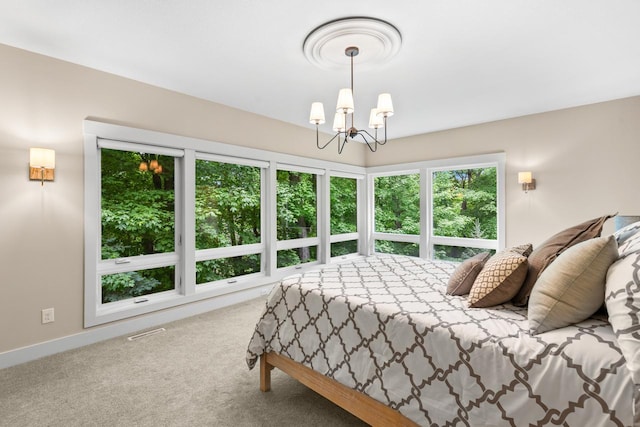 8580 Maple View Dr, Cologne, MN 55322 - carpeted bedroom with a chandelier and baseboards