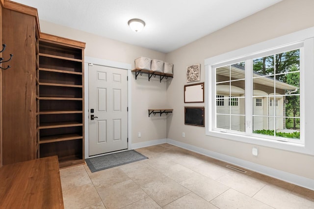 8580 Maple View Dr, Cologne, MN 55322 - mudroom featuring baseboards and light tile patterned flooring