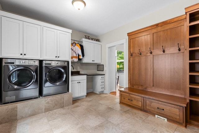 8580 Maple View Dr, Cologne, MN 55322 - washroom with cabinet space and washing machine and clothes dryer