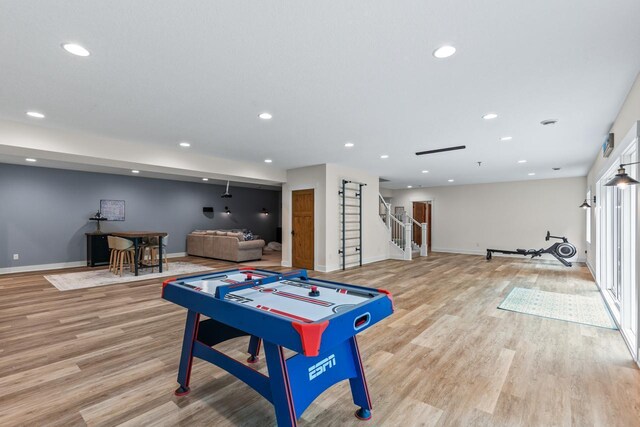 8580 Maple View Dr, Cologne, MN 55322 - playroom with light wood-style flooring, baseboards, and recessed lighting
