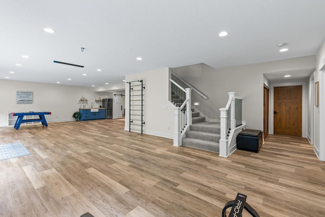 8580 Maple View Dr, Cologne, MN 55322 - workout room with recessed lighting, light wood-style floors, and baseboards