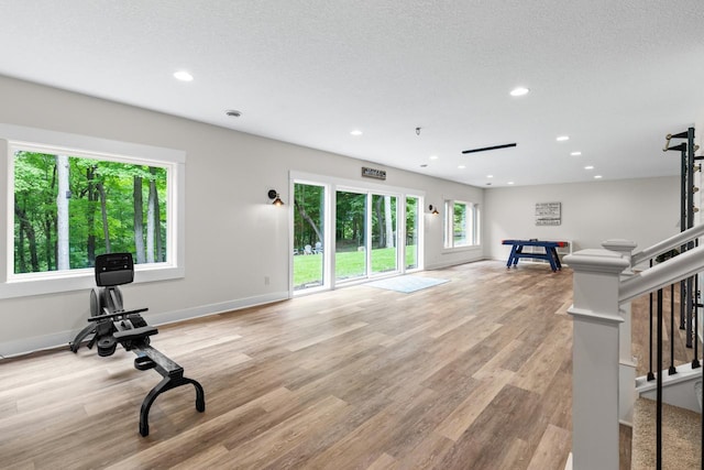 8580 Maple View Dr, Cologne, MN 55322 - exercise room with recessed lighting, light wood-type flooring, and baseboards