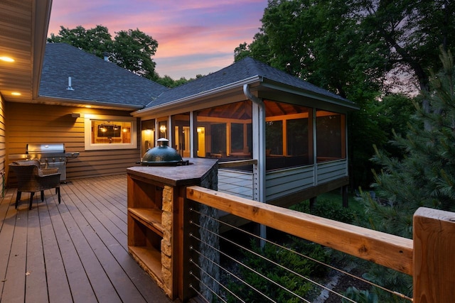 8580 Maple View Dr, Cologne, MN 55322 - deck at dusk with a sunroom and grilling area