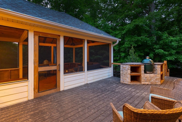 8580 Maple View Dr, Cologne, MN 55322 - view of patio featuring a deck, a sunroom, an outdoor kitchen, and view of wooded area