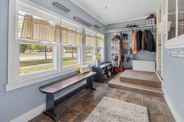 504 4th St, Brainerd, MN 56401 - mudroom featuring baseboards and dark stone finish flooring