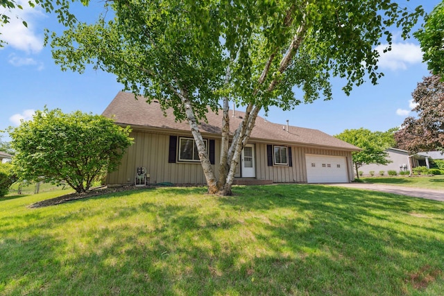 7674 Ideal Ave S, Cottage Grove, MN 55016 - ranch-style house featuring a garage, driveway, a front yard, and board and batten siding