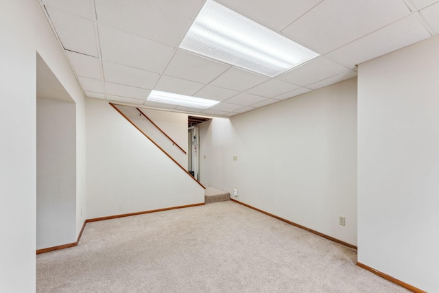7674 Ideal Ave S, Cottage Grove, MN 55016 - finished basement featuring carpet floors, baseboards, a paneled ceiling, and stairs