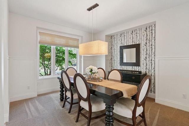 9375 Cold Stream Ln, Eden Prairie, MN 55347 - dining room with light colored carpet, a decorative wall, a wainscoted wall, and baseboards