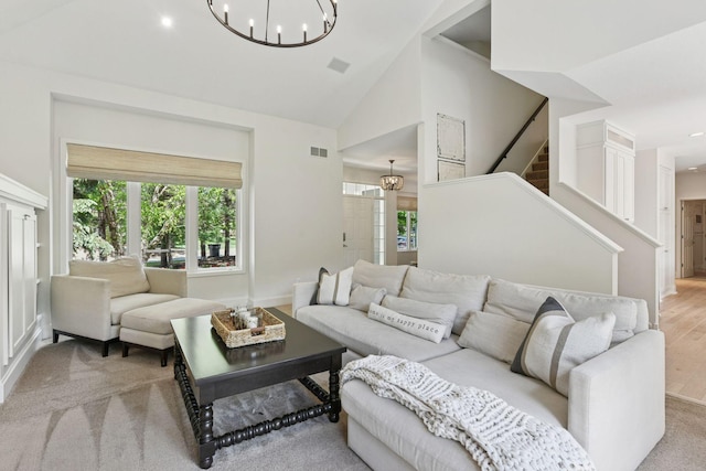 9375 Cold Stream Ln, Eden Prairie, MN 55347 - living area featuring a chandelier, plenty of natural light, high vaulted ceiling, light wood-style floors, and recessed lighting