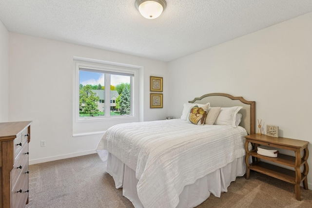 9375 Cold Stream Ln, Eden Prairie, MN 55347 - bedroom with carpet flooring, a textured ceiling, and baseboards