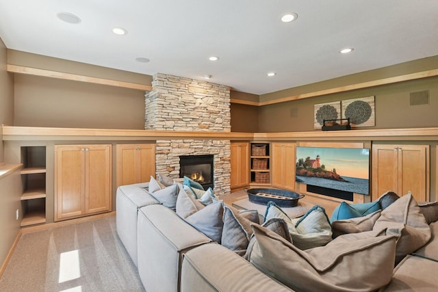9375 Cold Stream Ln, Eden Prairie, MN 55347 - living area with recessed lighting, a fireplace, and light colored carpet