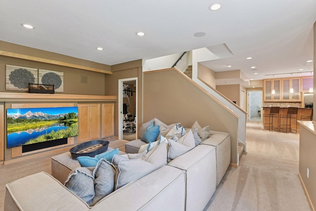 9375 Cold Stream Ln, Eden Prairie, MN 55347 - living area featuring light carpet, recessed lighting, and stairs