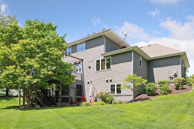 9375 Cold Stream Ln, Eden Prairie, MN 55347 - back of house featuring a lawn and a balcony