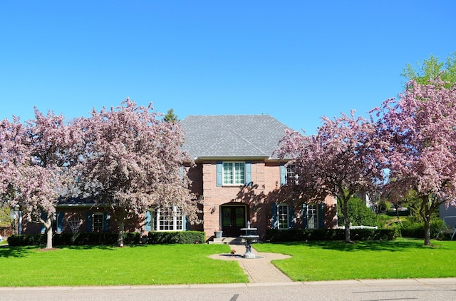 1511 Colleen Ave, Arden Hills, MN 55112 - traditional-style home featuring french doors and a front lawn