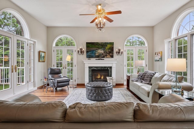 1511 Colleen Ave, Arden Hills, MN 55112 - living room with french doors, plenty of natural light, and wood finished floors