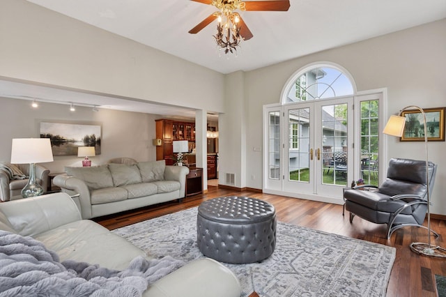1511 Colleen Ave, Arden Hills, MN 55112 - living area with wood finished floors, rail lighting, a ceiling fan, and baseboards