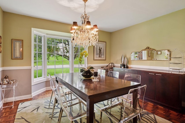 1511 Colleen Ave, Arden Hills, MN 55112 - dining area featuring a chandelier and baseboards
