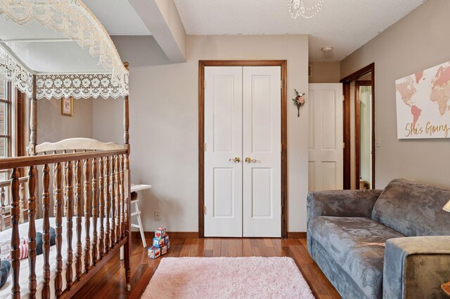 1511 Colleen Ave, Arden Hills, MN 55112 - bedroom with wood finished floors, a closet, and baseboards