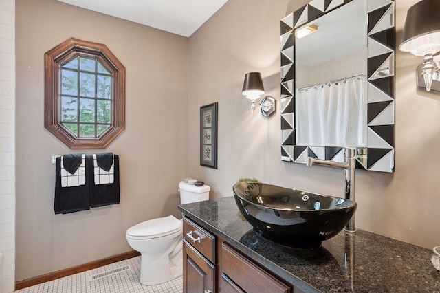 1511 Colleen Ave, Arden Hills, MN 55112 - bathroom featuring toilet, vanity, and a shower with curtain