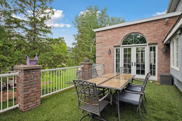 1511 Colleen Ave, Arden Hills, MN 55112 - view of patio featuring french doors and outdoor dining space