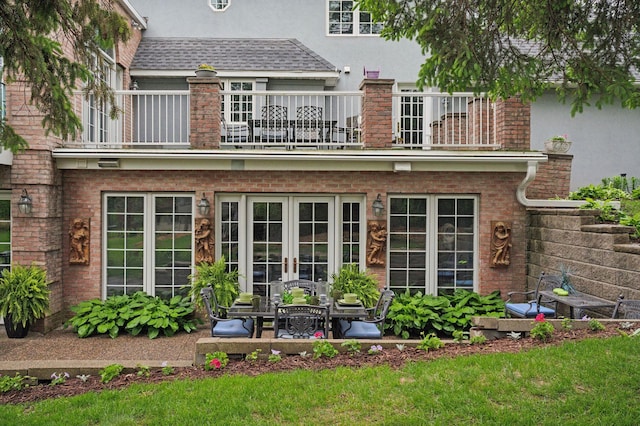 1511 Colleen Ave, Arden Hills, MN 55112 - back of house with a balcony, french doors, and stucco siding