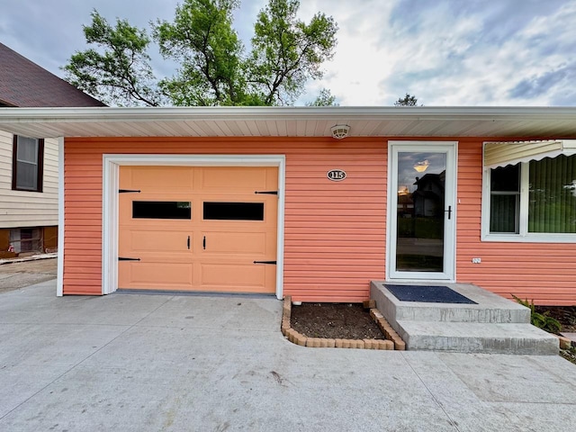 115 1st St SE, Pelican Rapids, MN 56572 - entrance to property featuring driveway and a garage