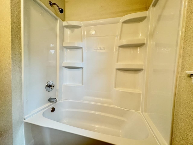 115 1st St SE, Pelican Rapids, MN 56572 - full bathroom with a textured wall and tub / shower combination