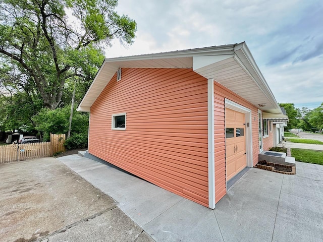 115 1st St SE, Pelican Rapids, MN 56572 - view of home's exterior with asphalt driveway