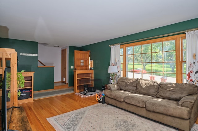 2003 20th Ave NW, Rochester, MN 55901 - living area featuring wood finished floors and stairs