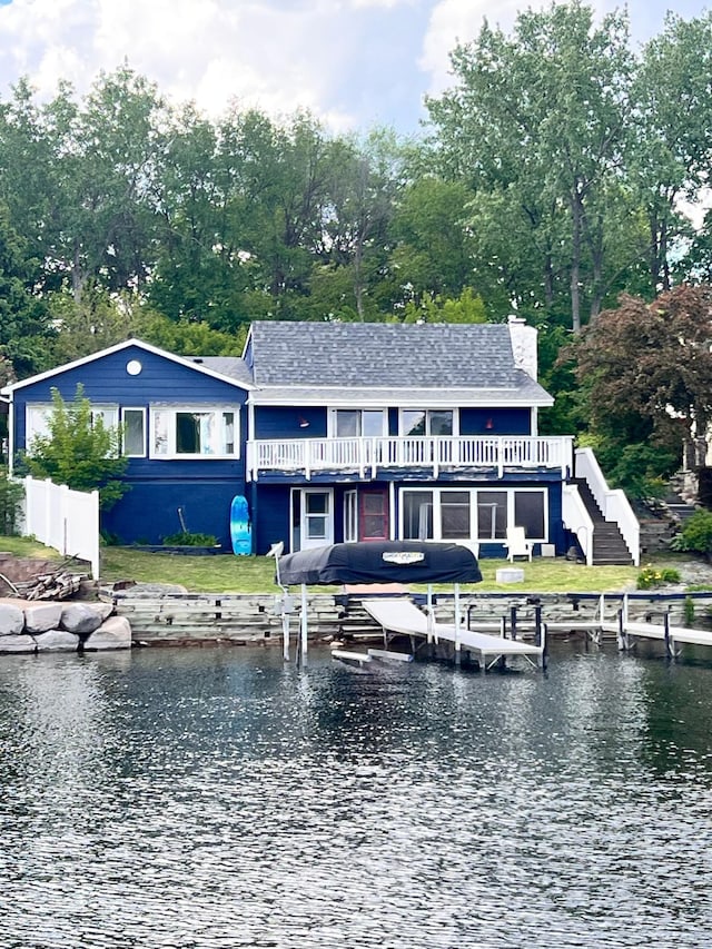 6412 Conroy St NE, Prior Lake, MN 55372 - rear view of house featuring boat lift, a water view, and stairway