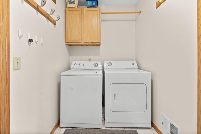 2101 Blake Ave, Lester Prairie, MN 55354 - washroom with cabinet space, separate washer and dryer, and baseboards