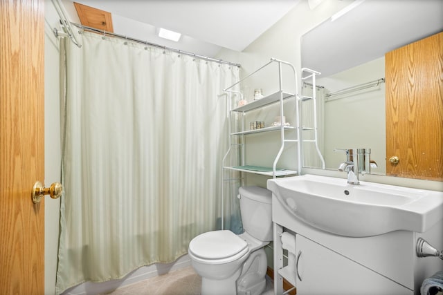 2101 Blake Ave, Lester Prairie, MN 55354 - bathroom with toilet, tile patterned floors, and vanity