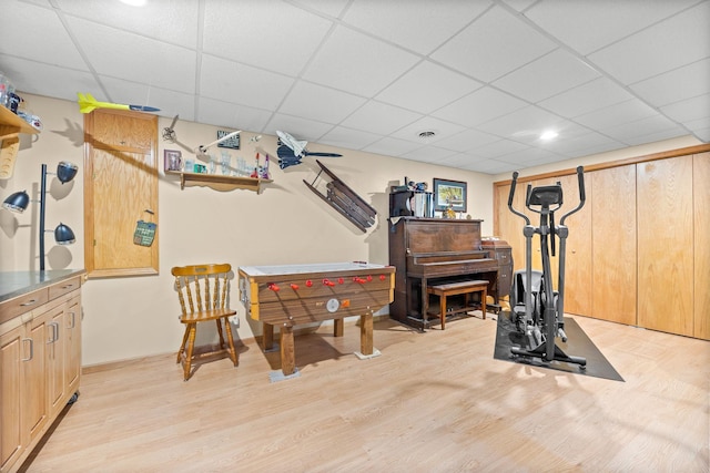 2101 Blake Ave, Lester Prairie, MN 55354 - exercise room featuring a drop ceiling and light wood-style flooring