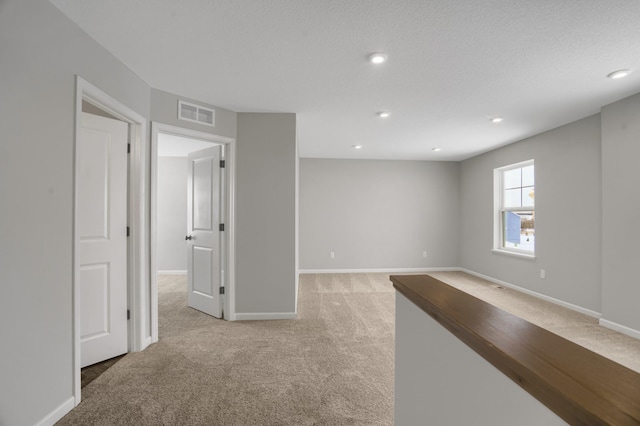 10664 29th St NE, Saint Michael, MN 55376 - empty room with light colored carpet, baseboards, and recessed lighting
