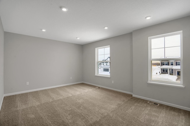 10664 29th St NE, Saint Michael, MN 55376 - unfurnished room with carpet flooring, baseboards, and recessed lighting