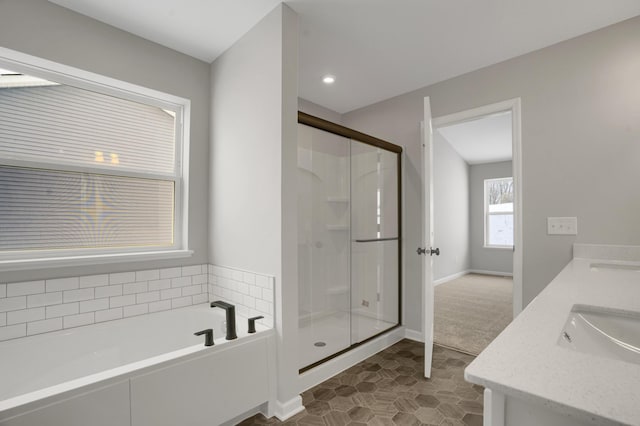 10664 29th St NE, Saint Michael, MN 55376 - bathroom with a garden tub, a stall shower, double vanity, tile patterned floors, and recessed lighting