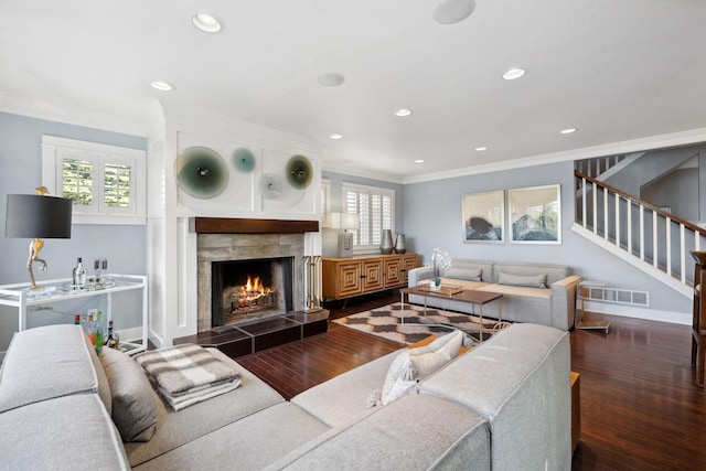 17209 Grays Bay Blvd, Minnetonka, MN 55391 - living room featuring crown molding, plenty of natural light, stairway, a tiled fireplace, and recessed lighting