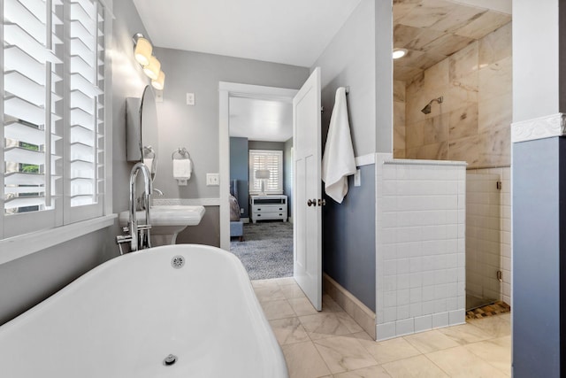 17209 Grays Bay Blvd, Minnetonka, MN 55391 - bathroom featuring ensuite bath, a freestanding bath, and a walk in shower