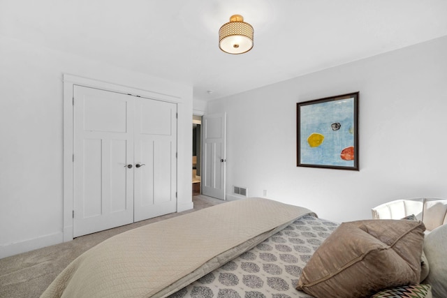 17209 Grays Bay Blvd, Minnetonka, MN 55391 - bedroom with light colored carpet, a closet, and baseboards