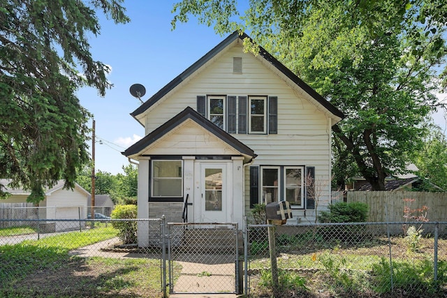 248 Ivy Ave W, Saint Paul, MN 55117 - view of front of home featuring a gate and a fenced front yard