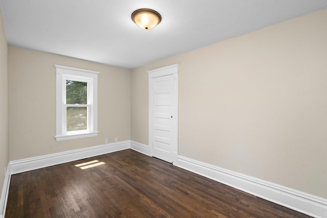 248 Ivy Ave W, Saint Paul, MN 55117 - spare room featuring dark wood-style floors and baseboards