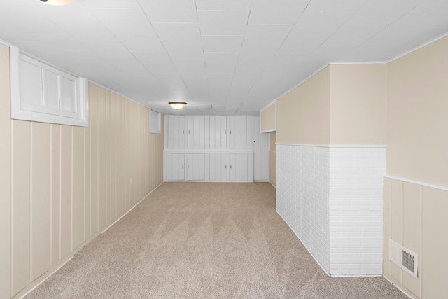 248 Ivy Ave W, Saint Paul, MN 55117 - additional living space with light carpet and a wainscoted wall