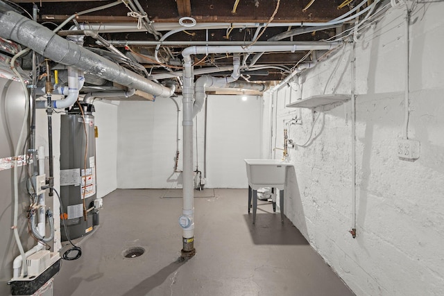248 Ivy Ave W, Saint Paul, MN 55117 - unfinished below grade area featuring gas water heater and a sink
