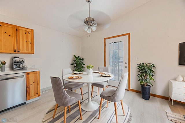 838 8th Ave E, West Fargo, ND 58078 - dining space with light wood finished floors, baseboards, and a ceiling fan