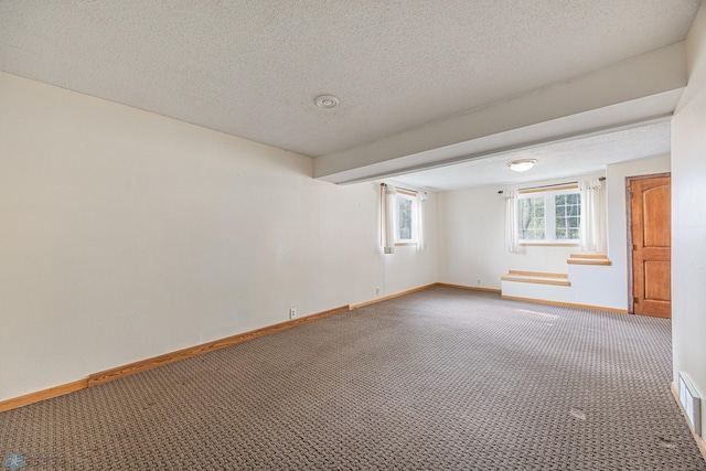 838 8th Ave E, West Fargo, ND 58078 - carpeted empty room featuring baseboards and a textured ceiling