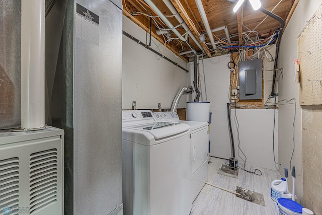 838 8th Ave E, West Fargo, ND 58078 - washroom featuring electric panel, washer and clothes dryer, and gas water heater