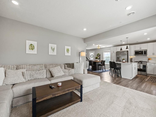 14540 112th Ave N, Dayton, MN 55369 - living room with recessed lighting and dark wood-style flooring