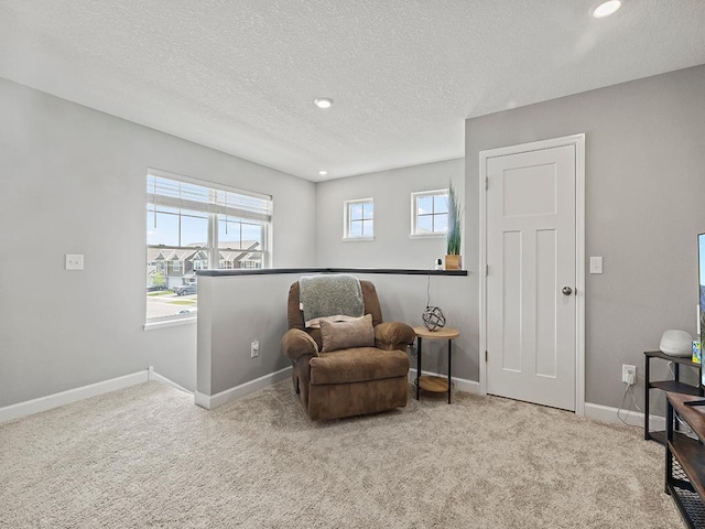 14540 112th Ave N, Dayton, MN 55369 - sitting room featuring a textured ceiling, recessed lighting, baseboards, and carpet floors